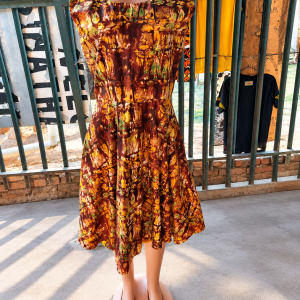 earthy batik dress market display